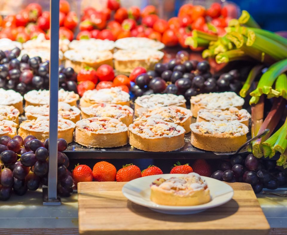 Delicious tasty sweet desserts and cakes in the shop with takeaway